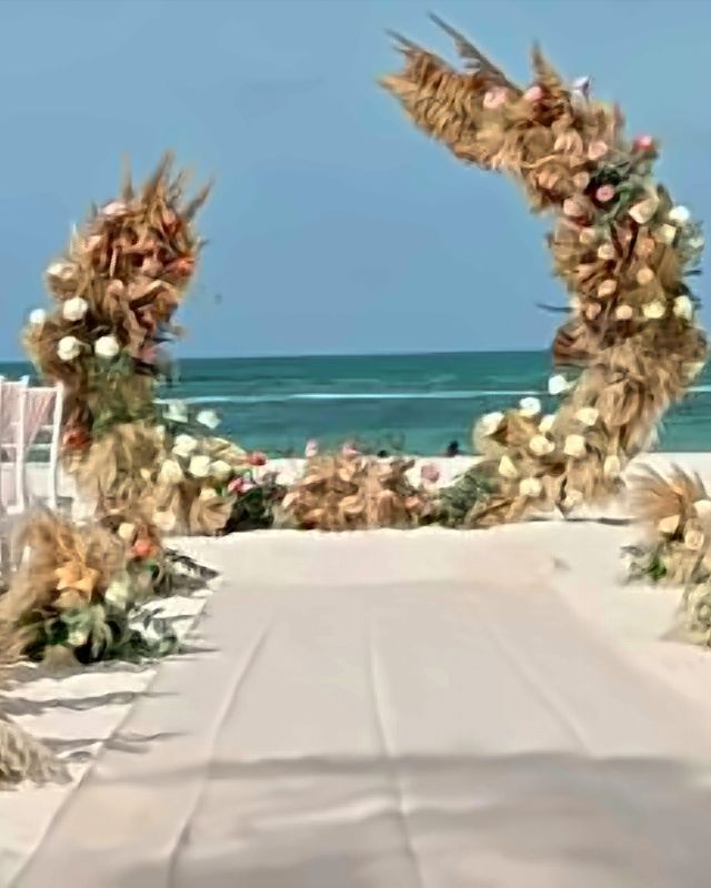 Boho floral arch on the beach